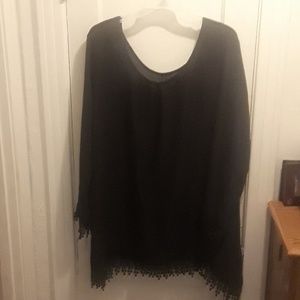 Thin, long sleeve, black dress with tassels